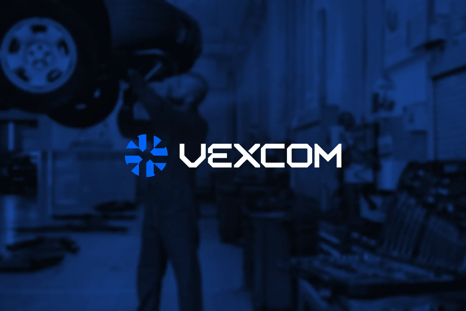 VEXCOM logo over a repair shop, with a mechanic working under a car on a lift, in shades of blue